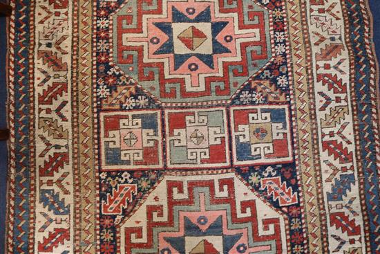 A Shirvan multi coloured runner, c.1900, 8ft 9in by 3ft 1in.